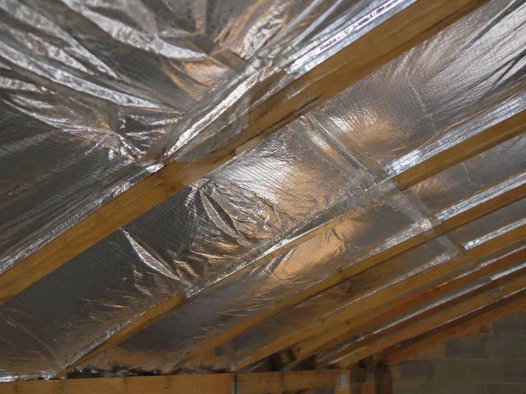 Taped foil joints along the rafters
